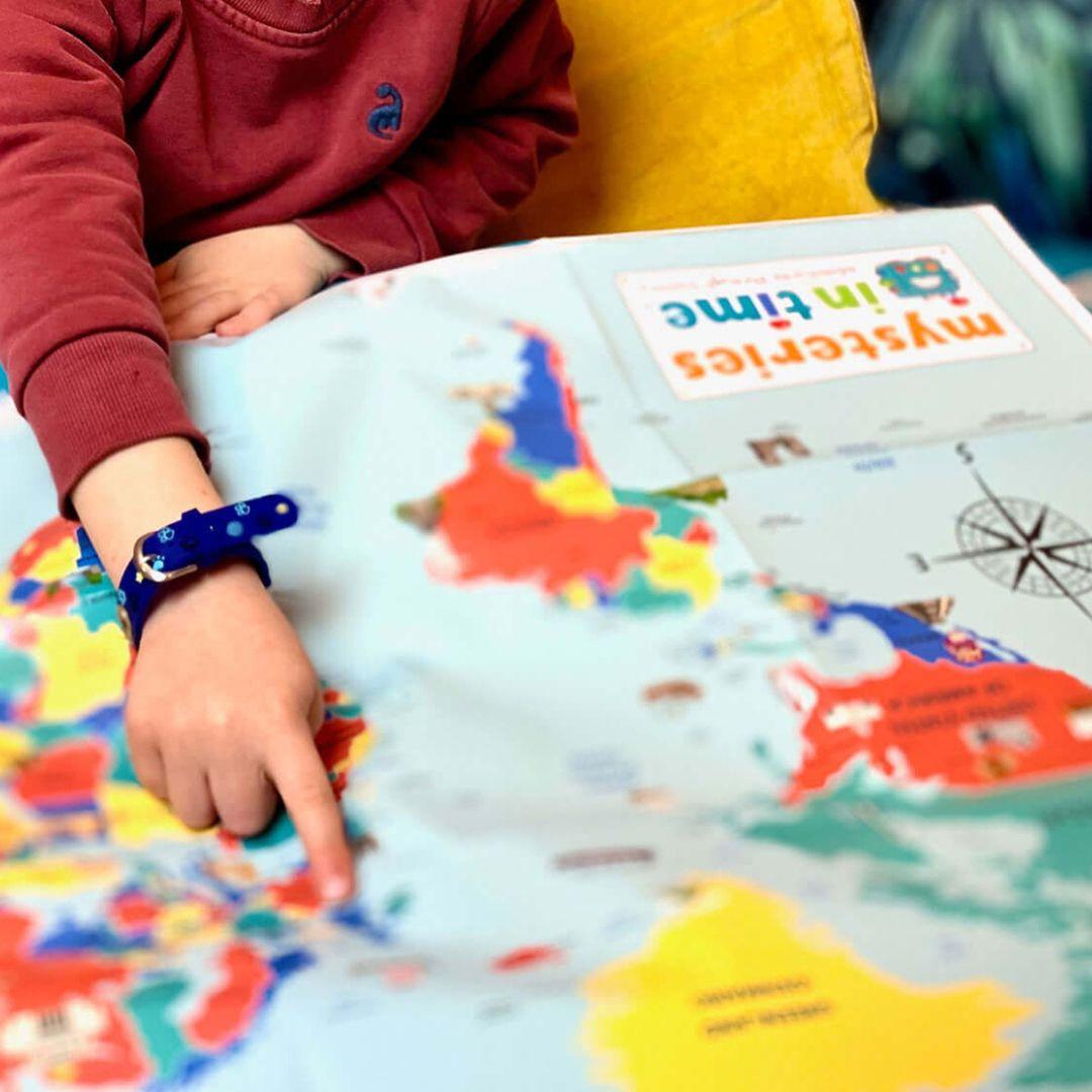 Boy reading Mysteries in Time magazine